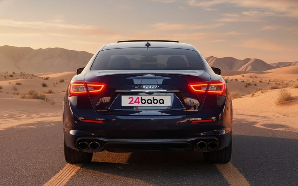 Maserati Ghibli 2020 Blue rear view showing taillights – rental in Dubai Maserati Ghibli 2020 Blue rear view showing taillights – rental in Dubai